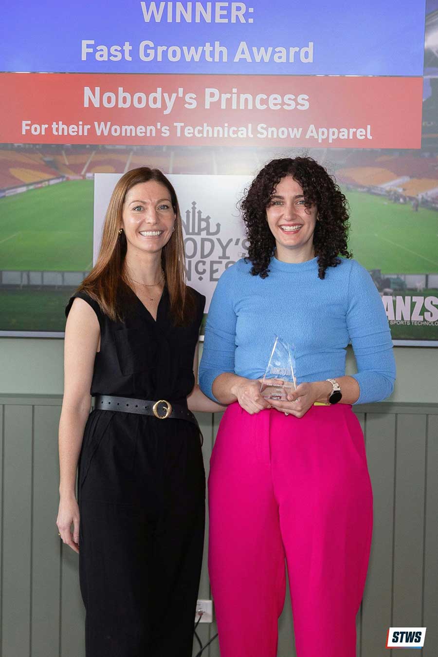 Amy Crosland presenting Maria Baker with the STWS Fast Growth Award 2024